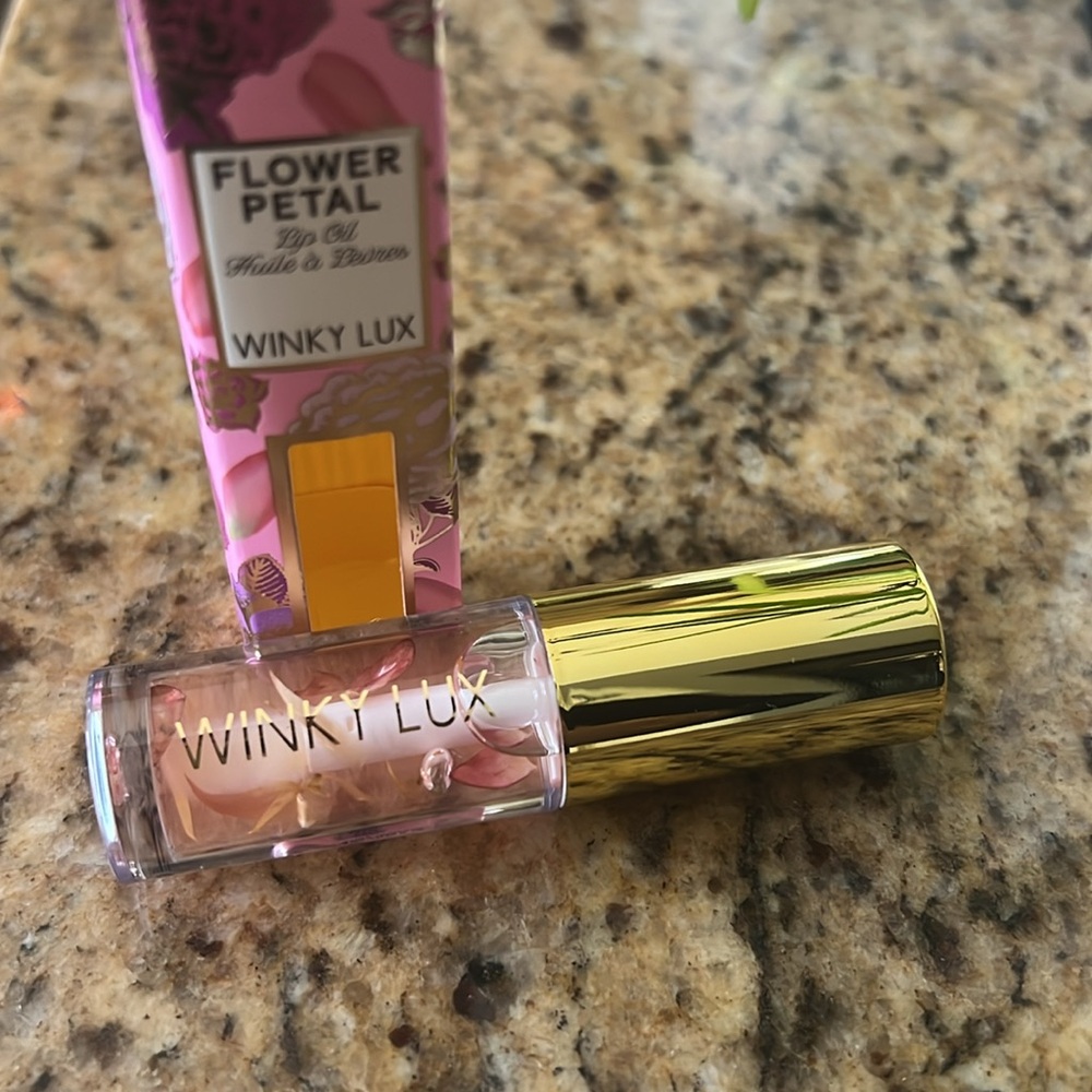 New in box! Winky Lux lip oil.